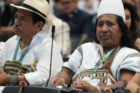 Los participantes escuchan el discurso de apertura de la conferencia sobre biodiversidad COP16 en Cali, Colombia.