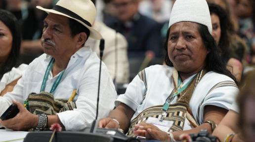 Los participantes escuchan el discurso de apertura de la conferencia sobre biodiversidad COP16 en Cali, Colombia.